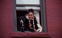 Girl and Dog in Window
