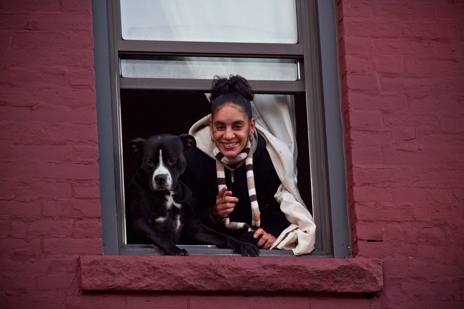 Girl and Dog in Window