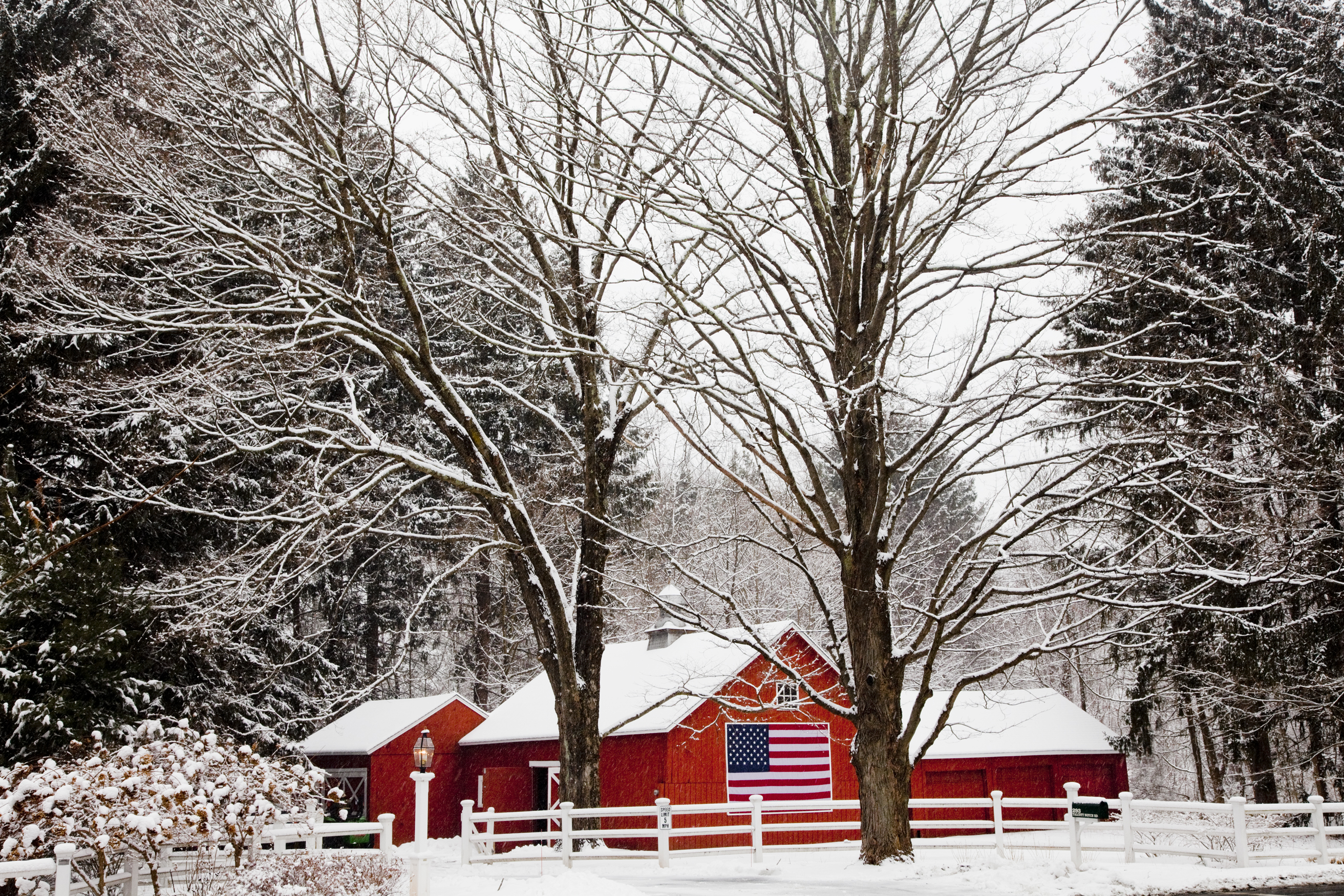 Flag on Red Barn