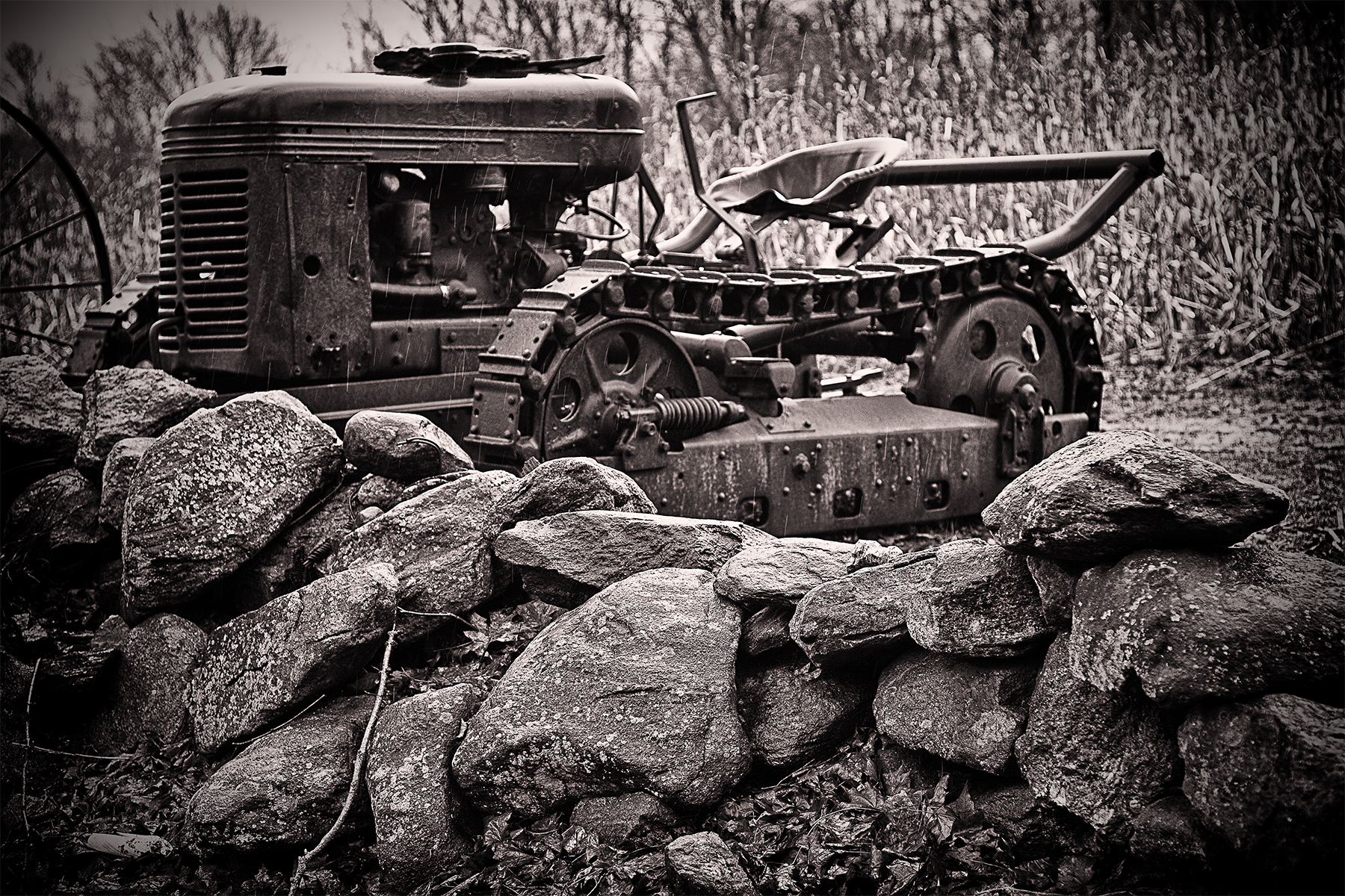 Stone wall and tractor at R Farms